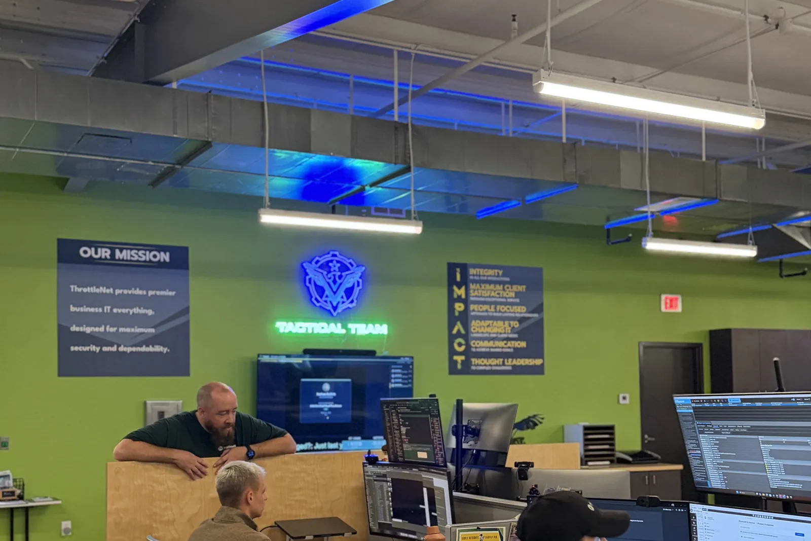 ThrottleNet mission and values boards above the operations floor
