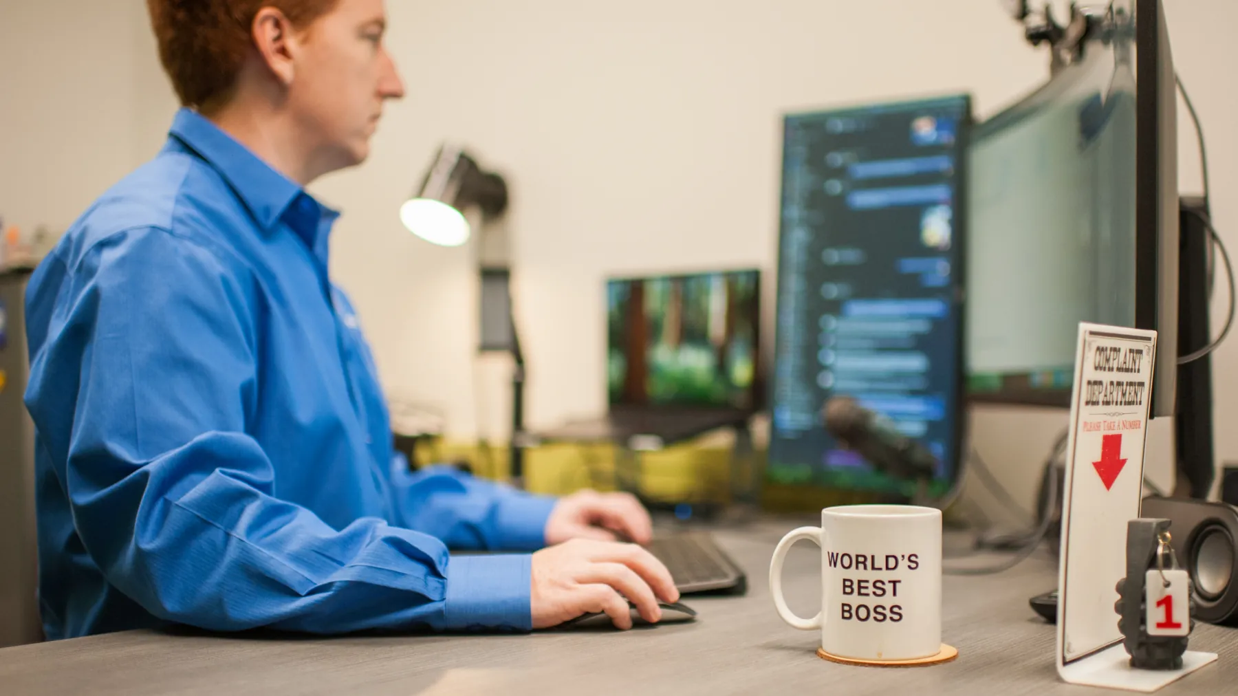 A ThrottleNet help desk technician working a support queue across two monitors